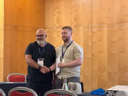 Hafsteinn Einarsson receiving the best paper certificate from conference co-chair Demetrios G. Sampson at CELDA 2026.